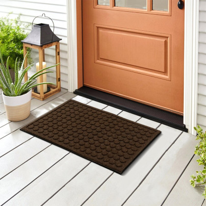 Hnědá textilní gumová čistící vstupní rohož FLOMA Rounds - 45 x 75 x 1,1 cm