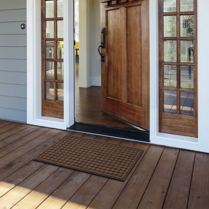 Hnědá textilní gumová čistící vstupní rohož FLOMA Rounds - 45 x 75 x 1,1 cm