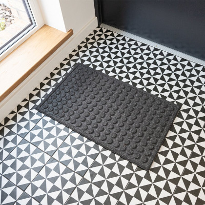 Černá textilní gumová čistící vstupní rohož FLOMA Rounds - 45 x 75 x 1,1 cm